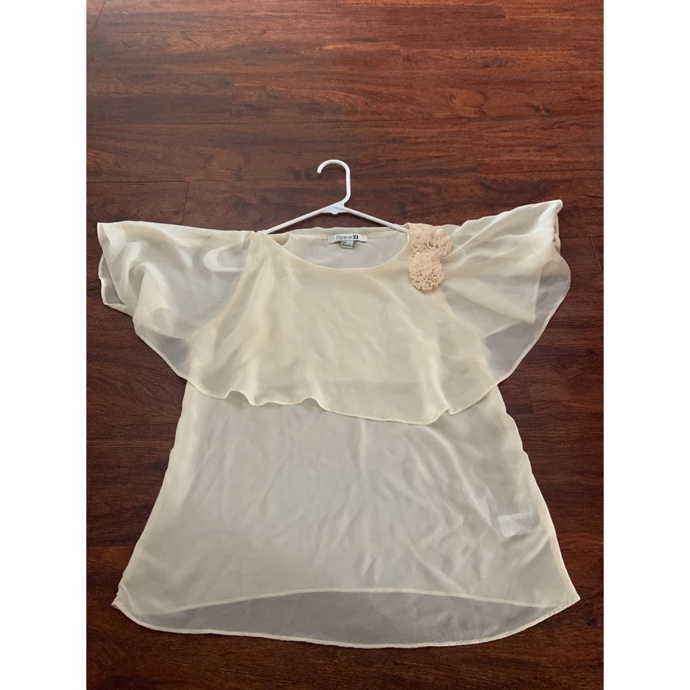 Sheer cream blouse with flower detail